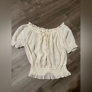 Women’s cream sheer top